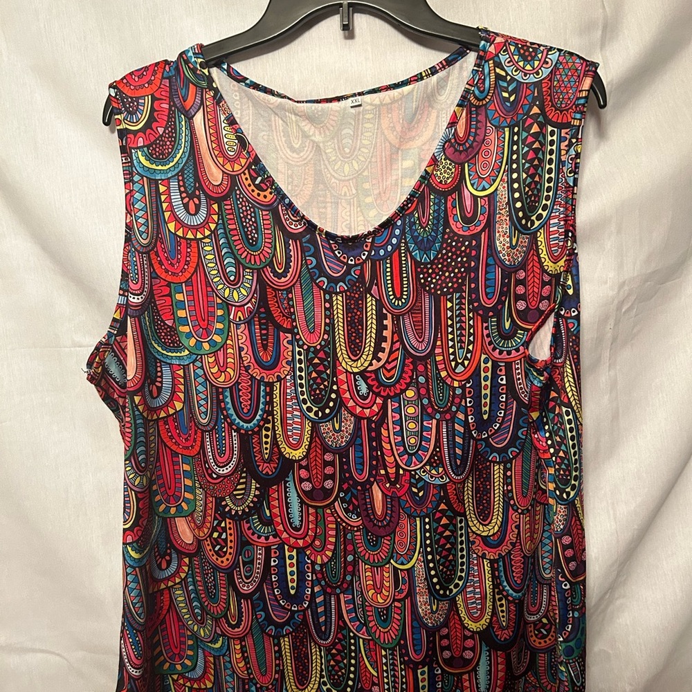 Vivid colorful sleeveless blouse. Can be worn with almost any color.